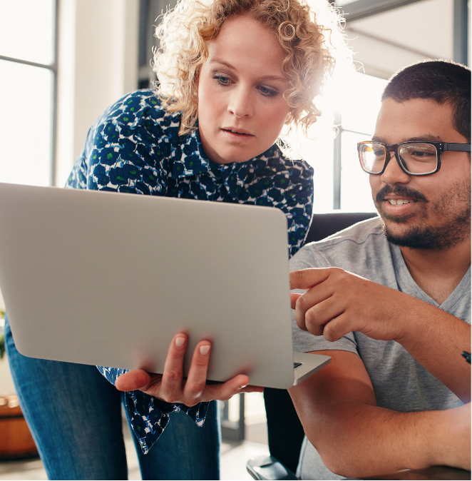 Teacher and student on laptop